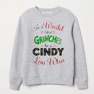 IN A WORLD FULL OF GRINCHES SUBLIMATION SWEATSHIRT